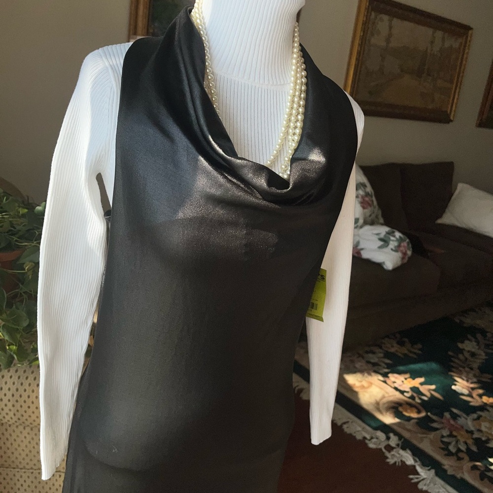 Black fax leather stretch  halter Dress with side slit’s on on the lower legs